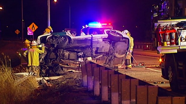The car came to a rest on its side. (9NEWS)