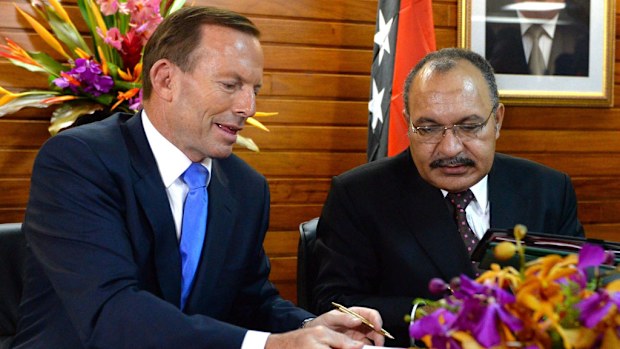 Prime Minister Tony Abbott with Papua New Guinea Prime Minister Peter O'Neill at a meeting in March. (AAP)