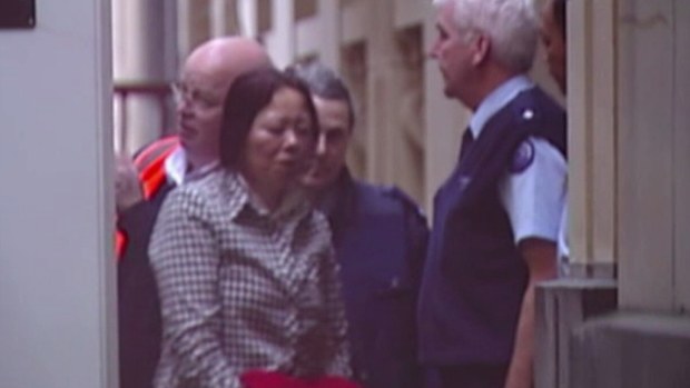 Huajiao Zhuang had to be removed from court after she became hysterical. (9NEWS)