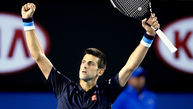 Serbian Novak Djokovic celebrates after defeating Fernando Verdasco of Spain in their third round match at the Australian Open in Melbourne. (AAP)