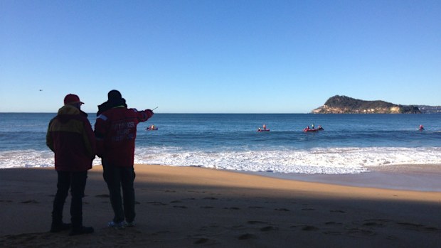 Searchers coordinate the hunt for missing boy Chayce Kofe off Pearl Beach in NSW. (AAP)
