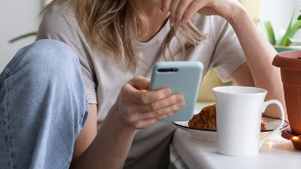 Woman listening to podcast