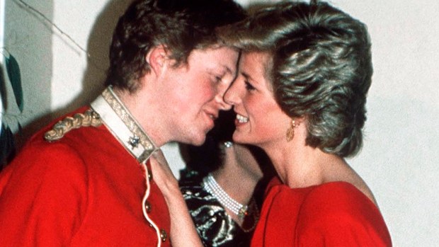 Princess Diana greets her brother Charles at a charity ball.