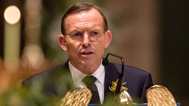 Prime Minister Tony Abbott delivers remarks at a national memorial service for the victims of Malaysia Airlines Flight MH17 at St Patrick's Cathedral in Melbourne. (AAP Image/Reuters Pool, Mark Dadswell)