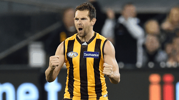 Hawthorn Hawks captain Luke Hodge celebrates after kicking a goal. (AAP)