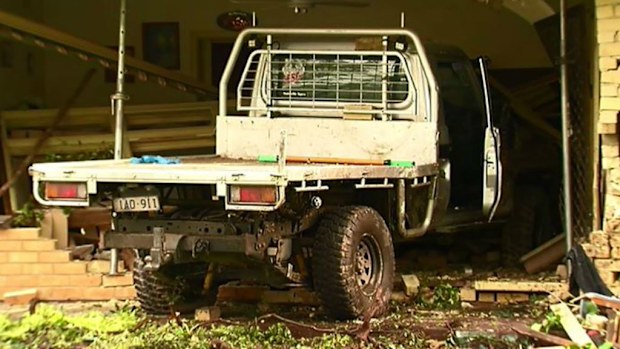 The driver is still on the run after crashing into a Lilydale home this morning. (9NEWS)