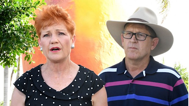 Senator Pauline Hanson (left) with One Nation Queensland Bowen candidate Sam Cox (right) announced a policy to build a new coal fired power station in Collinsville (Image: AAP)