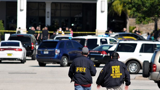 FBI respond to the scene of a shooting at the Melbourne Square Mall in Florida. (AAP)
