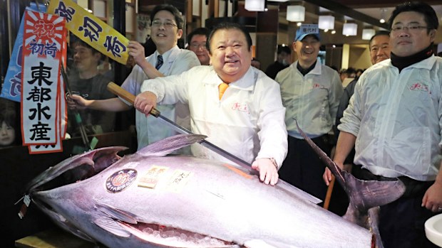 Kiyoshi Kimura and the 220kg fish. (AFP)