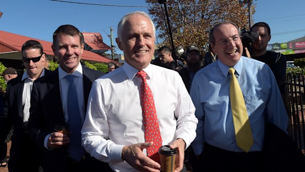 NSW Premier Mike Baird, Australian Prime Minister Malcolm Turnbull and local MP for Eden-Monaro Peter Hendy are seen during a street walk in Merimbula on the NSW South Coast. (AAP)