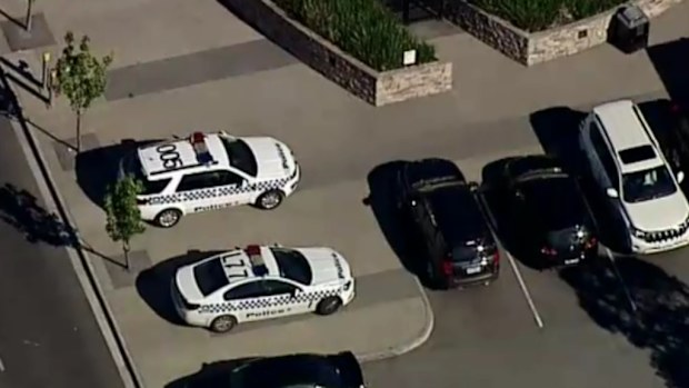 A woman was taken to hospital after allegedly being attacked by an axe at Fountain Gate Shopping Centre. (9NEWS)