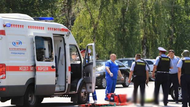 An ambulance at the scene where a police officer was killed. (AFP)