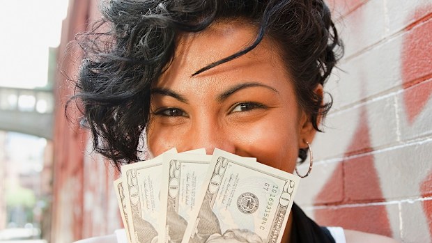 Woman holding cash