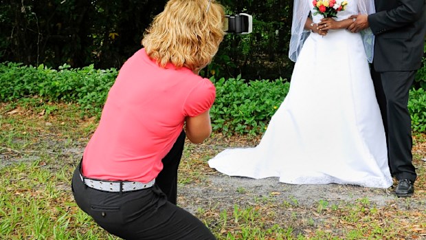 The wedding photographer made the mistake during the photo portion of the day.