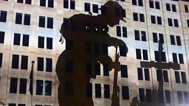 Projections on the walls of Sydney's buildings during 2015 Anzac Day services. (9NEWS)