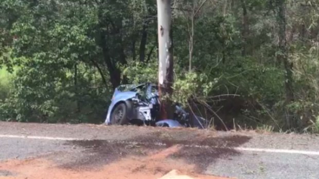 A teenage girl has died after the car she was travelling in crashed into a tree on Tamborine Mountain. (9NEWS)