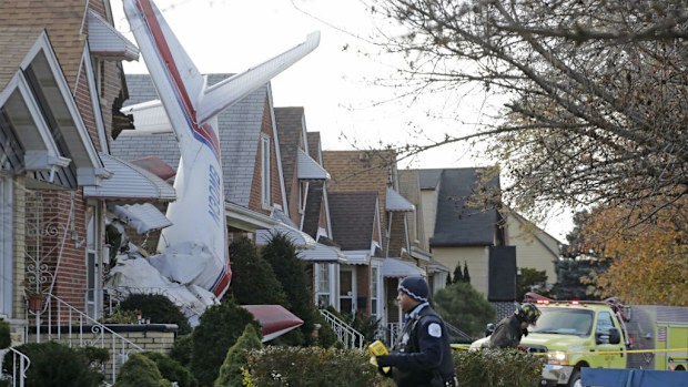 The Aero Commander 500 slammed into the front of the home in the early hours of Tuesday, killing its pilot. (AAP)