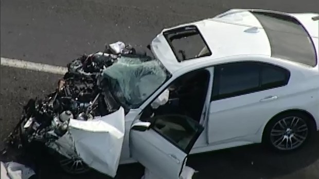 The male driver of the sedan died at the scene. (9NEWS)