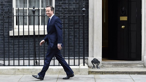 David Cameron leaves Downing St to meet the Queen. (AAP)