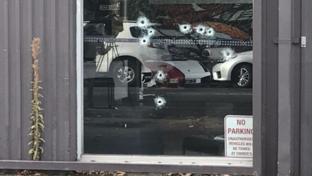 Multiple shots were fired into the Richmond luxury car dealership. (9NEWS/ Allan Raskall)