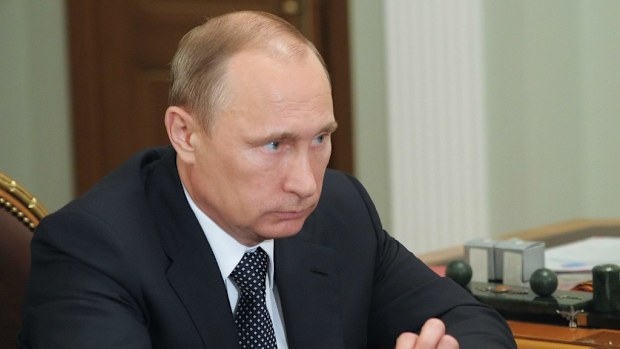 Russian President Vladimir Putin in discussions about flight MH17. (EPA/ALEKSEY BABUSHKIN/RIA NOVOSTI/KREMLIN POOL)