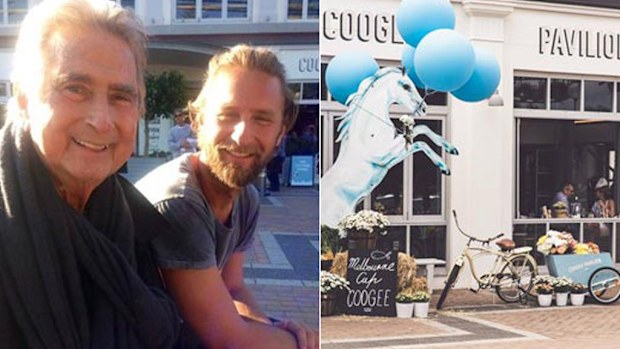 Justin Hemmes with his late father and Merivale founder John outside the Coogee Pavilion. (Facebook)