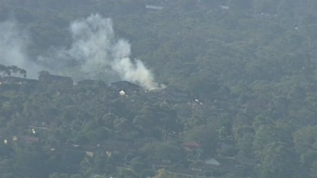 A house is on fire at Alfords Point in NSW. (9NEWS)