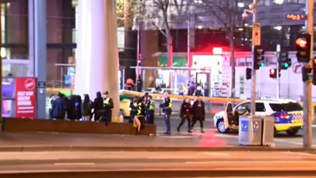 A policeman was allegedly punched outside Southern Cross Station in Melbourne's CBD. (9NEWS)