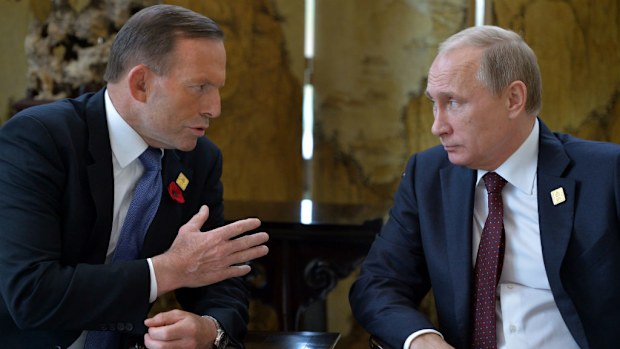 Tony Abbott speaks with Russian President Vladimir Putin. (AAP)