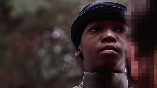 A new propaganda film released by ISIL shows a young boy executing a Syrian prisoner. 