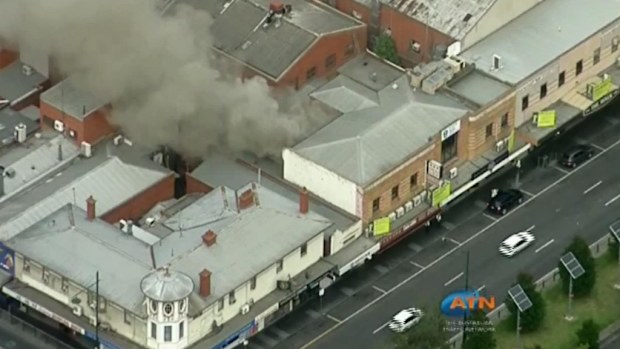 Seven fire trucks have been called to the restaurant fire in Box Hill. (ATN)