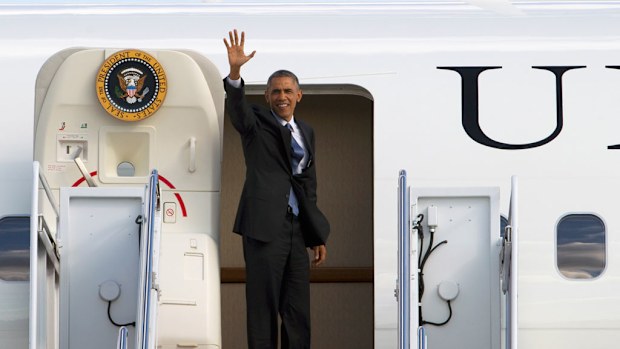 US President Barack Obama boarding presidential plane Air Force One. (AAP)
