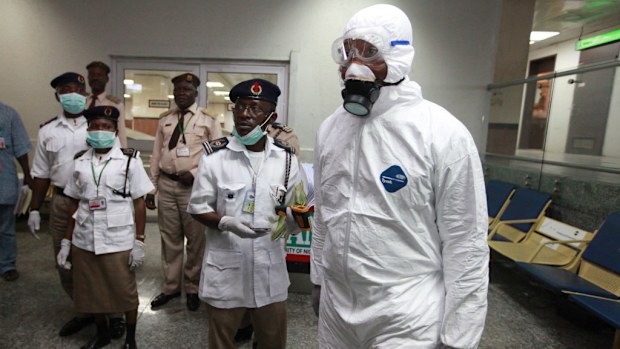 Health workers in Nigeria are battling an Ebola outbreak that has killed more than 900 people. (AAP)