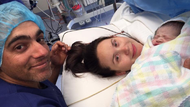 Amanda and husband at birth