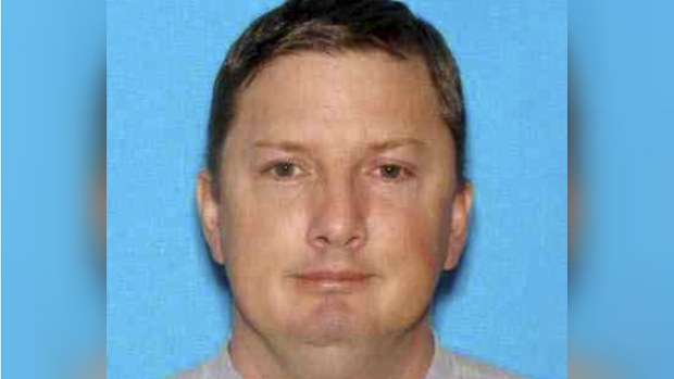 An Oregon drivers license photo of Neal Falls.