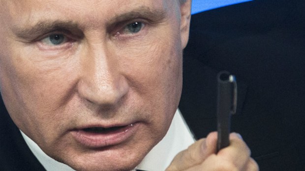 Russian President Vladimir Putin gestures during his annual press conference in Moscow. (AAP)