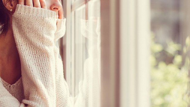 Sad wife thinking of leaving her husband
