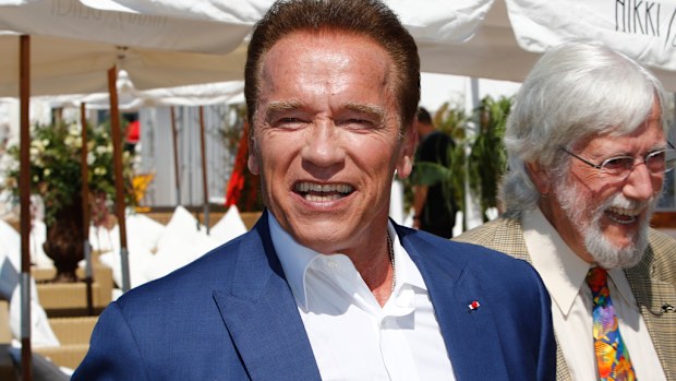 Arnold Schwarzenegger poses at a photocall to promote the release of 'Wonders of the Sea 3D' during the 70th Annual Calm Festival at Nikki Beach in Cannes, France. (AFP)