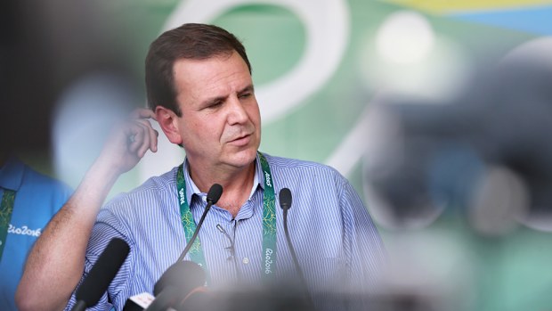 Rio de Janeiro's Mayor Eduardo Paes speaks to the press after the opening ceremony of the Olympic Village of the Rio 2016 Olympic Games in Rio de Janeiro, Brazil, on July 24, 2016. (AFP)