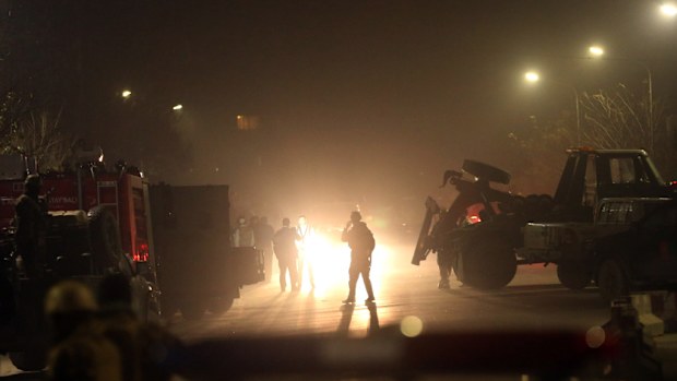 Security forces near the scene of the attack in Kabul, Afghanistan. (AAP)