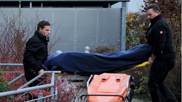 A body is carried out of the nursing home in Hamm, Germany. (AAP)