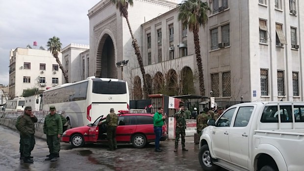 Syrian security forces cordon off the area after the suicide blasts. (AFP) 
