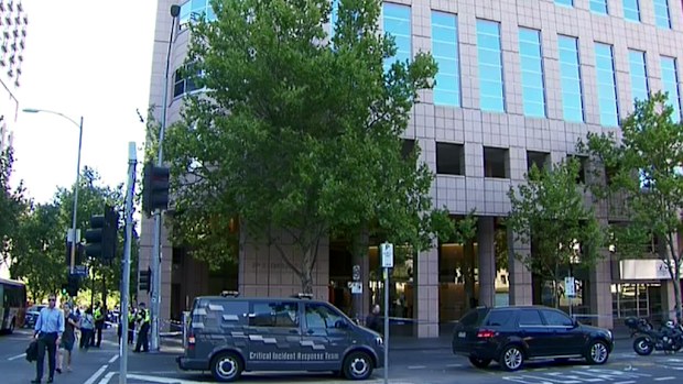 Police and firefighters attended the incident at the ATO building in Melbourne. (9NEWS)