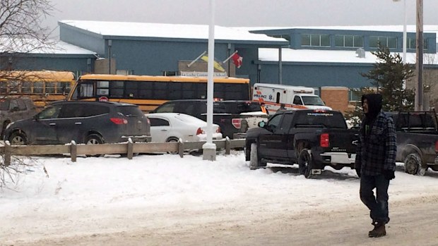 Police at the scene of the shooting in Saskatchewan. (AFP)