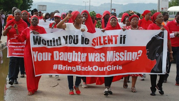 Protestors march by shouting slogans under the ''Bring back our girls'' campaign for the missing Nigerian schoolgirls. (Getty Images)