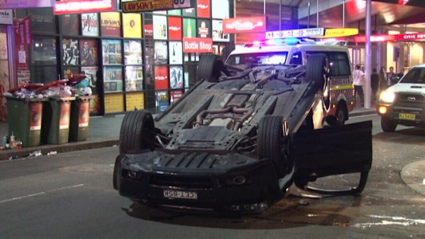 A car rolled over on Pitt Street, Sydney. (9NEWS)