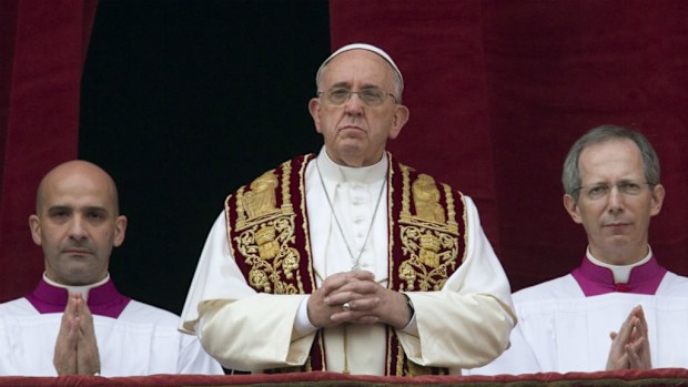 Pope Francis delivers his 'Urbi et Orbi' blessing from the central balcony of St Peter's Basilica. (AAP)