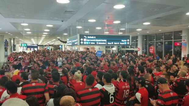 Fans gather at Sydney Airport to welcome home the Western Sydney Wanderers. (Twitter)
