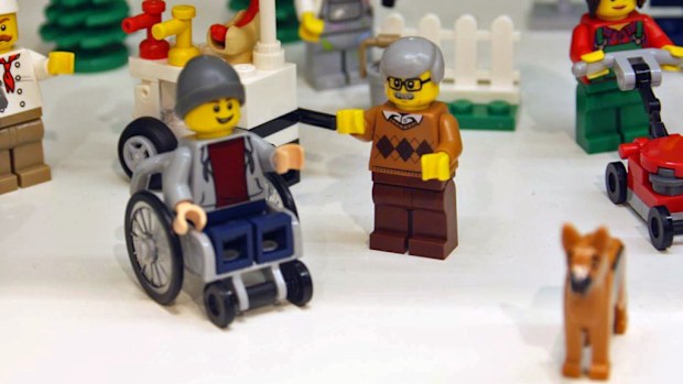 The new minifigure, joined by what appears to be an assistance dog. (Facebook/Promobricks)