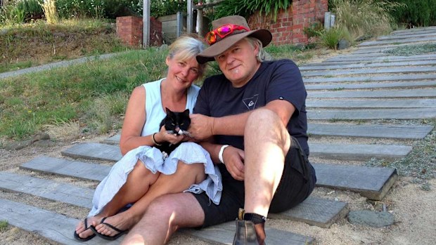 Lesly and Tony Maly with Muppet. (AAP)